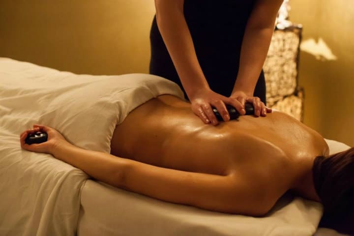 calming massage with hot stones