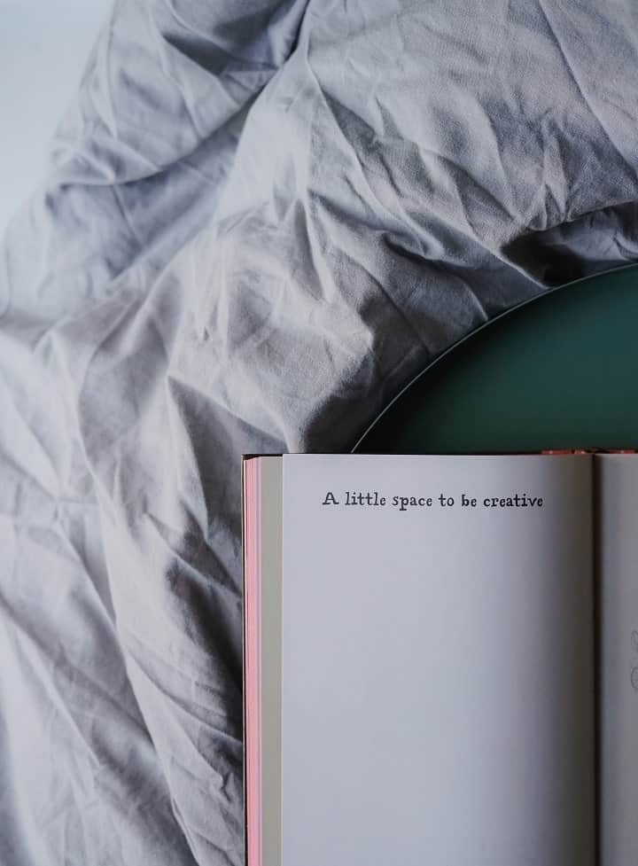 a book laying on the bed