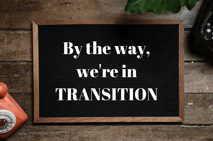 by the way we're in transition - words on a blackboard
