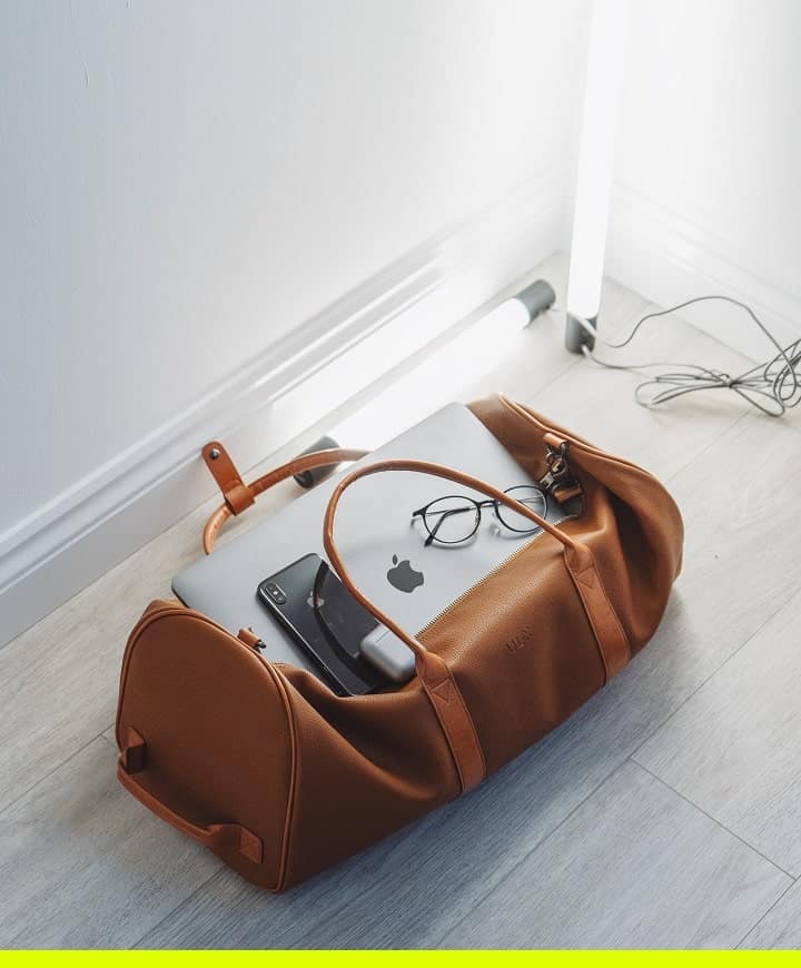 a duffel bag with a laptop in it