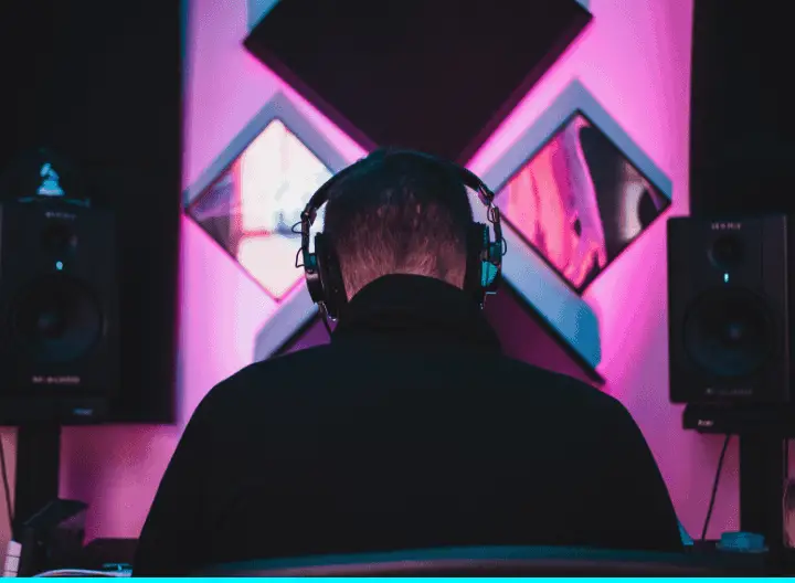 person in a studio with large headphones - featured image
