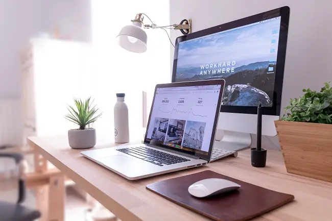 freelance desk with a big monitor