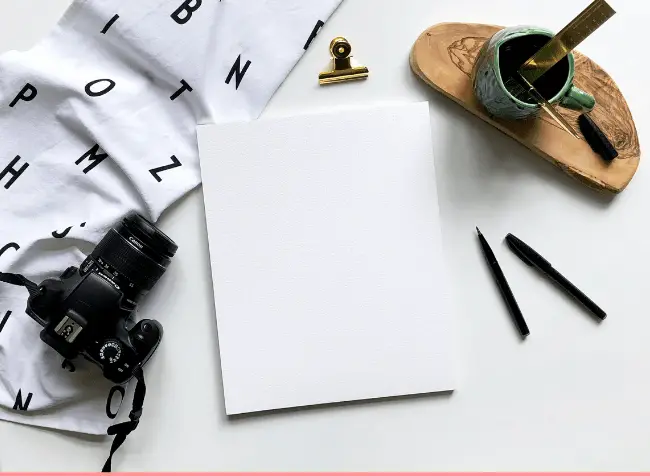 writing tools and a camera