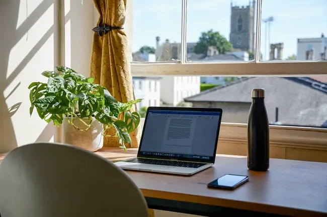 home office desk with a laptop