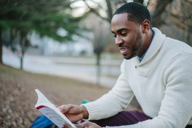 man enjoying a book