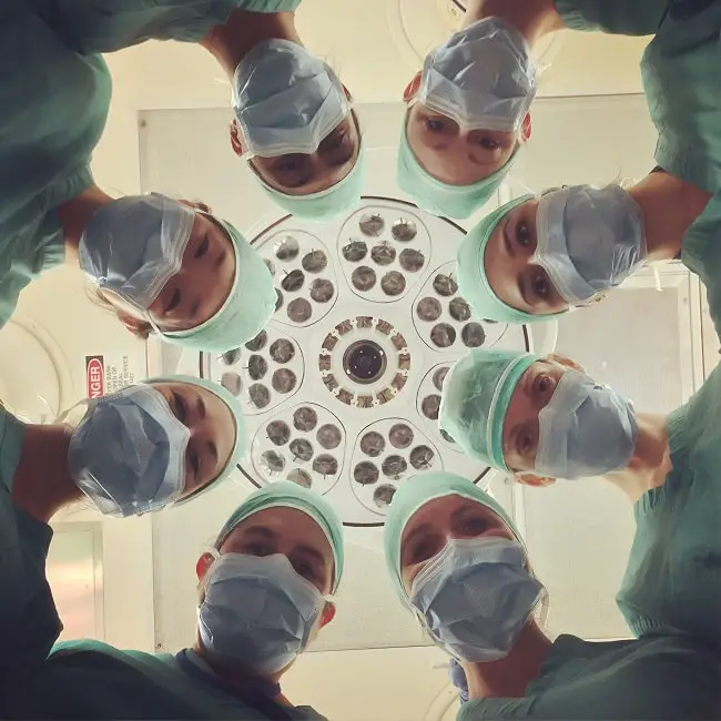 doctors in a circle-min