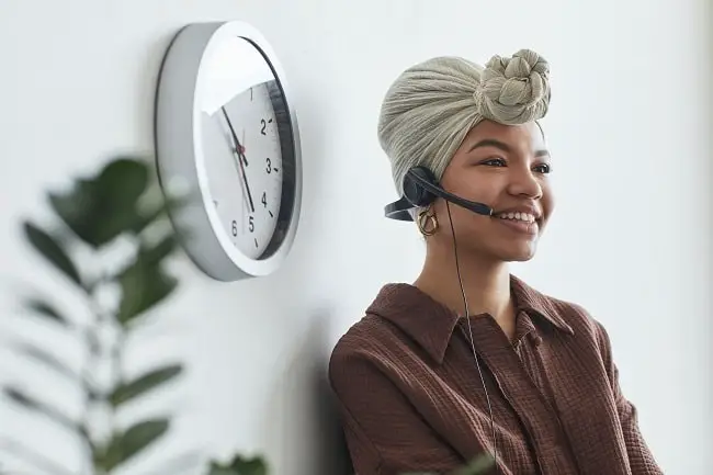 happy woman dictating with a headset