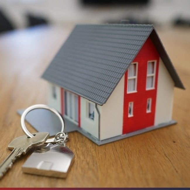 real estate - house miniature with keys