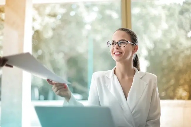 woman preparing document