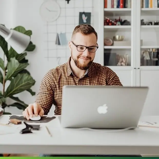 blogger working on laptop