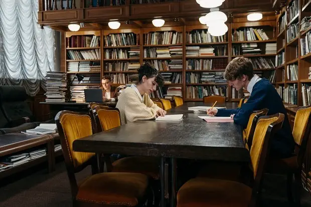 college students in a library