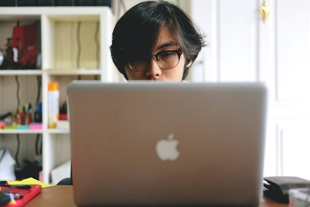 young man doing research