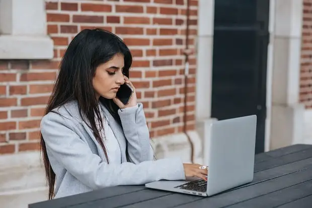 young woman investing in stocks