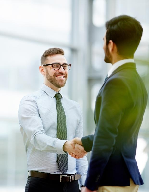 two male businessmen making a business deal