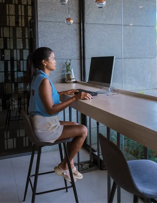 young person working remotely in a public space