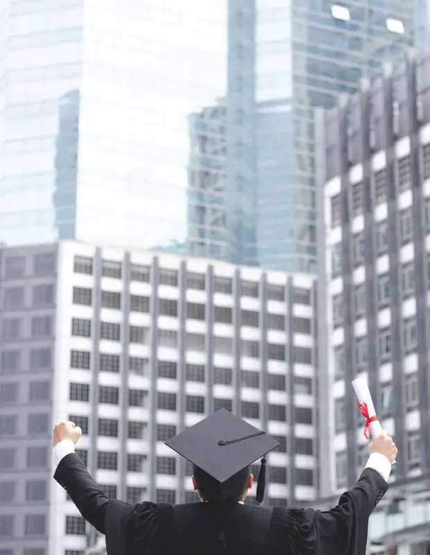 an mba student celebrating graduation in a financial district