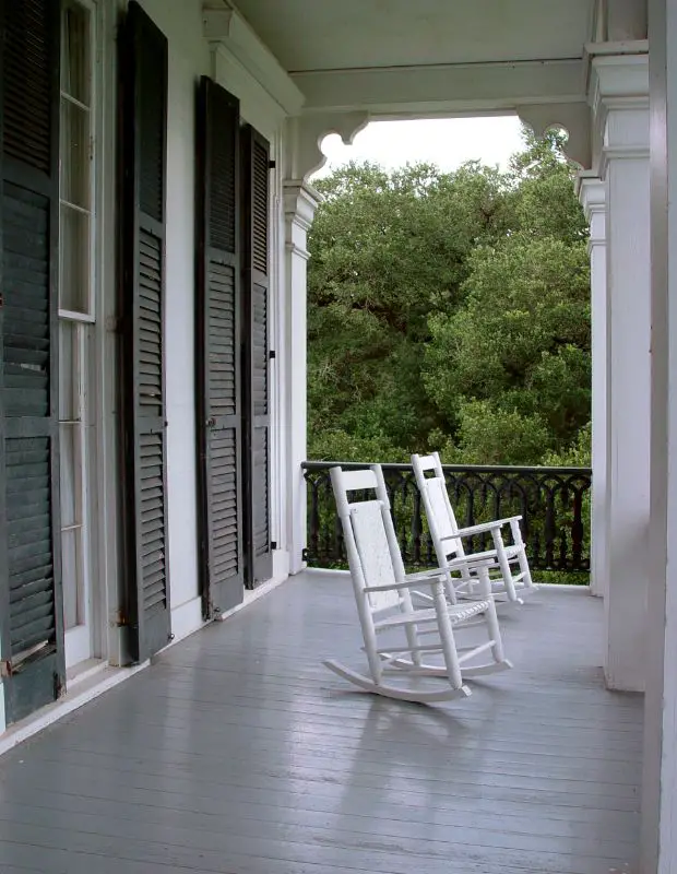 A traditional porch with rocking chairs in Louisiana