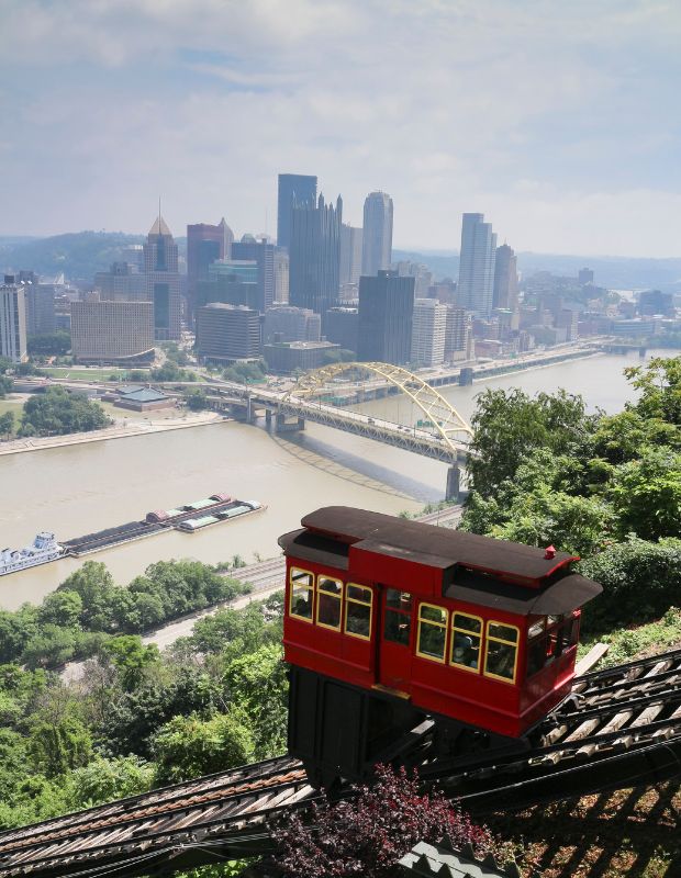a tram in Pittsburgh with a view of the city