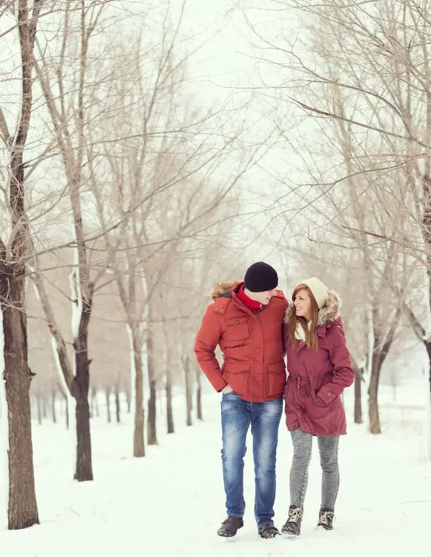 a couple walking in winter