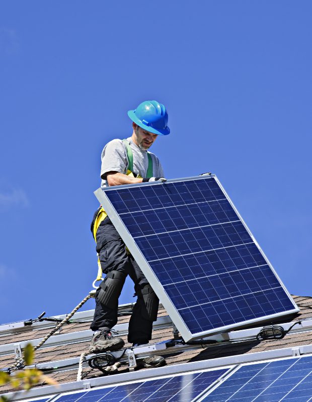installing a solar panel on the roof