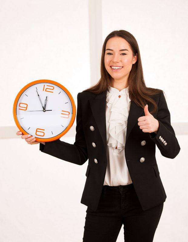 time management girl holding a clock